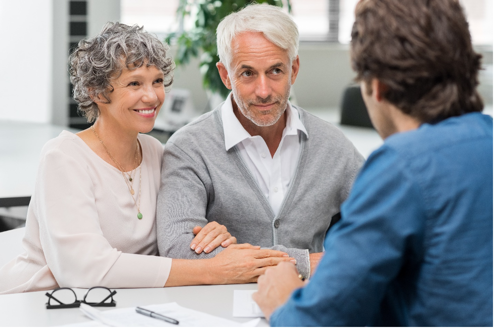 Couple meets with financial advisor.